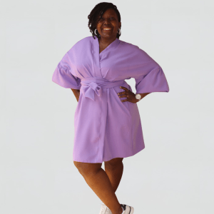 Woman in purple wrap dress, casual outfit