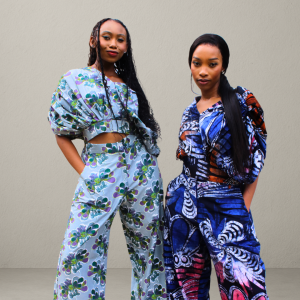 Woman wearing Cocoon Top and Pants Set in unique batik African print, handcrafted cotton two-piece outfit.